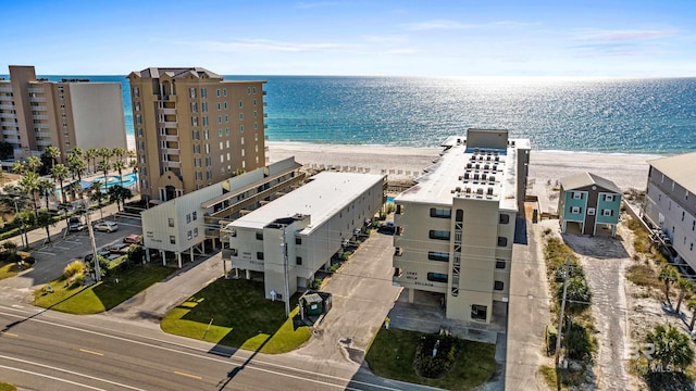 aerial view featuring a water view and a view of the beach