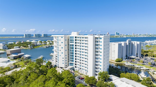 aerial view featuring a view of city and a water view