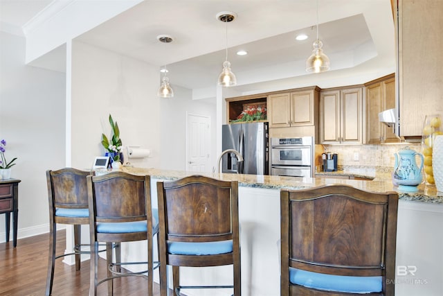 kitchen featuring open shelves, backsplash, light stone countertops, stainless steel fridge, and exhaust hood