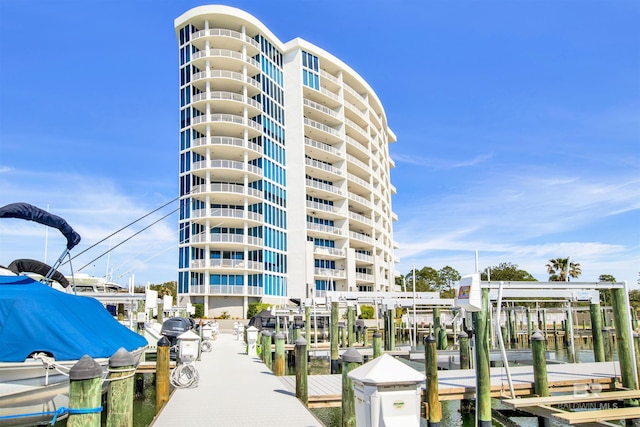 view of building exterior featuring boat lift