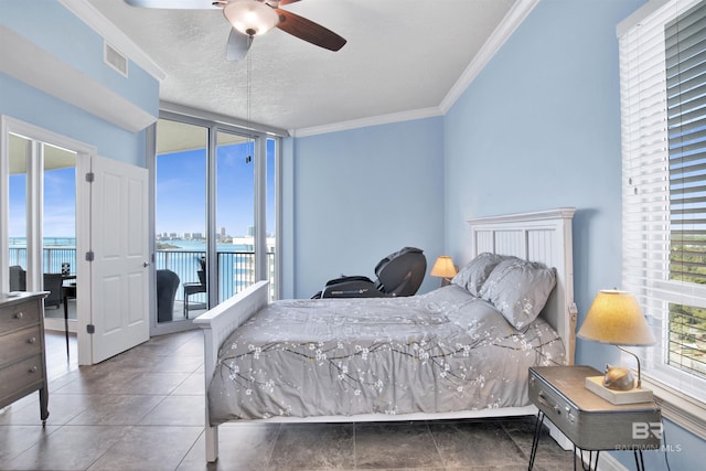 tiled bedroom featuring a textured ceiling, visible vents, a ceiling fan, access to outside, and ornamental molding