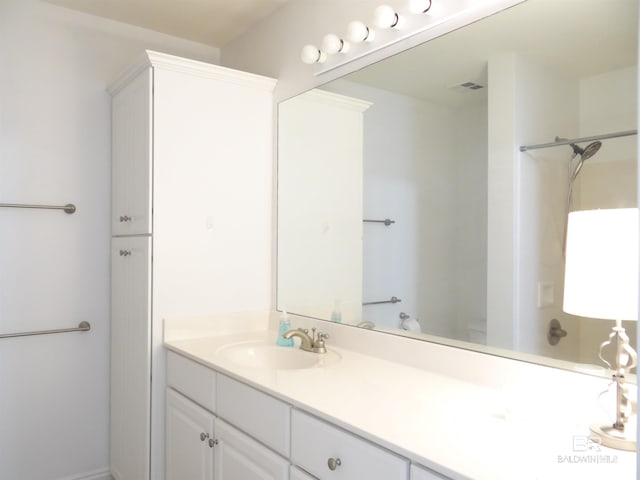 full bathroom with visible vents, a shower, toilet, and vanity