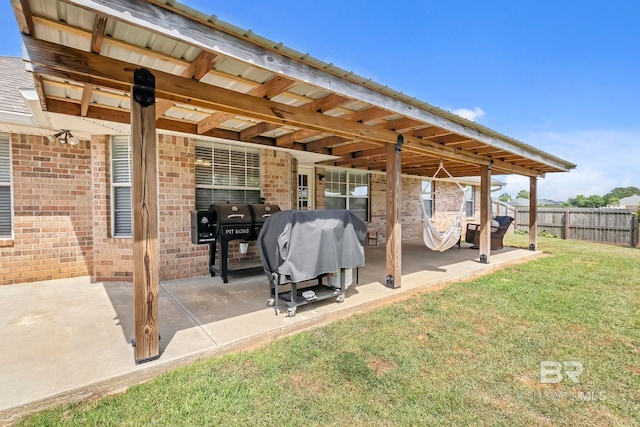view of patio / terrace featuring fence
