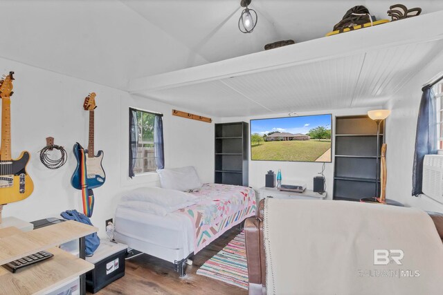 bedroom with wood finished floors