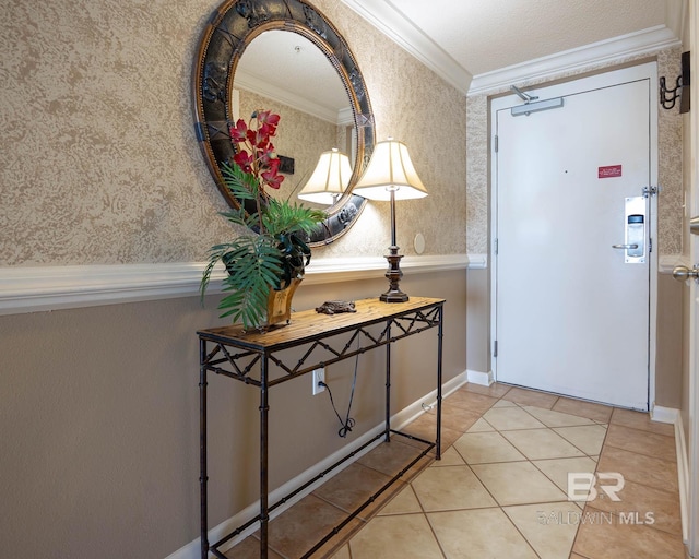 tiled foyer featuring ornamental molding