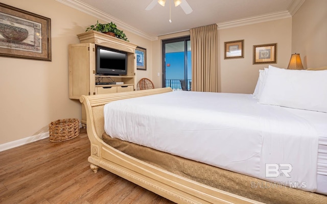 bedroom featuring hardwood / wood-style floors, access to outside, ornamental molding, and ceiling fan