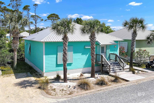 view of front of property featuring metal roof