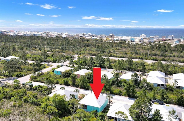 bird's eye view with a water view and a residential view