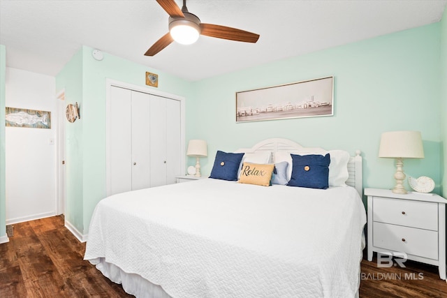 bedroom featuring a closet, ceiling fan, and dark wood-type flooring