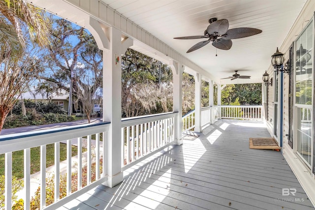 deck featuring ceiling fan and covered porch