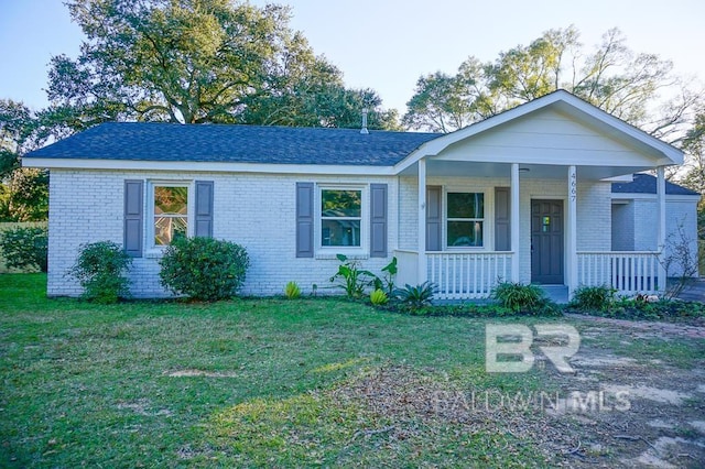 ranch-style house with a front lawn and a porch