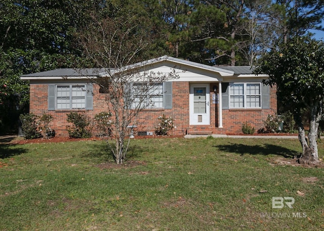 single story home featuring a front lawn