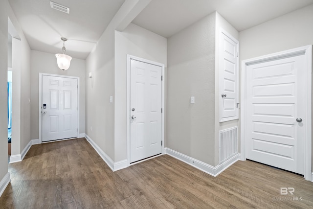 foyer with hardwood / wood-style floors