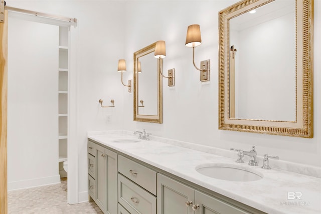 bathroom featuring tile patterned floors and vanity