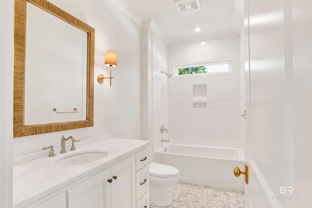 full bathroom with toilet, tiled shower / bath combo, and vanity