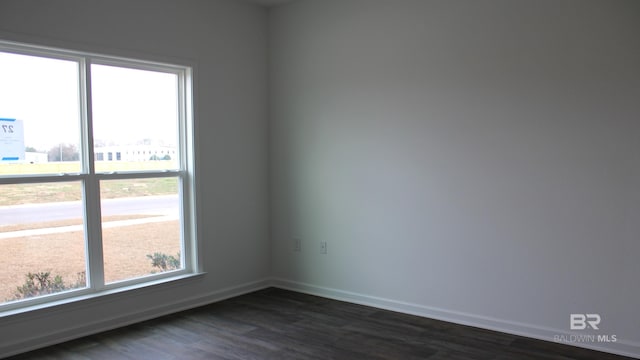 8992 Chabo Cir, Foley, AL 36535 - empty room with dark wood-style flooring and baseboards