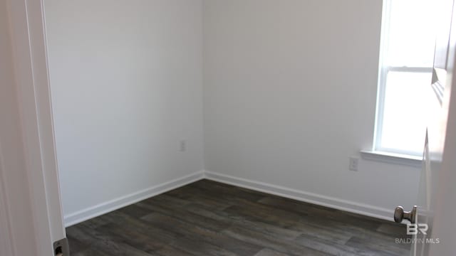 8992 Chabo Cir, Foley, AL 36535 - empty room featuring dark wood finished floors and baseboards