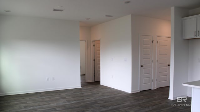 8992 Chabo Cir, Foley, AL 36535 - spare room with dark wood-type flooring and baseboards