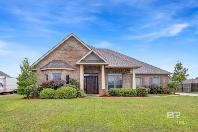 view of front of home with a front yard