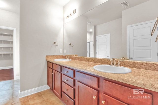 bathroom featuring vanity and tile patterned floors