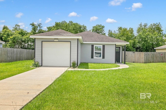 15030 Marem Dr, Foley, AL 36535 - ranch-style home with concrete driveway, a garage, and roof with shingles
