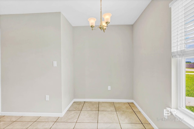 15030 Marem Dr, Foley, AL 36535 - unfurnished room with a chandelier and light tile patterned floors