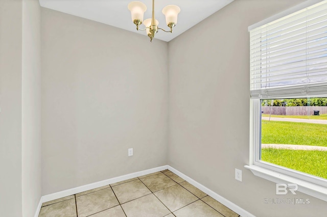 15030 Marem Dr, Foley, AL 36535 - empty room with a chandelier and light tile patterned floors