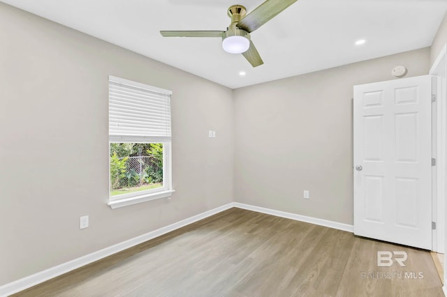 15030 Marem Dr, Foley, AL 36535 - spare room with wood finished floors, a ceiling fan, recessed lighting, and a smoke detector