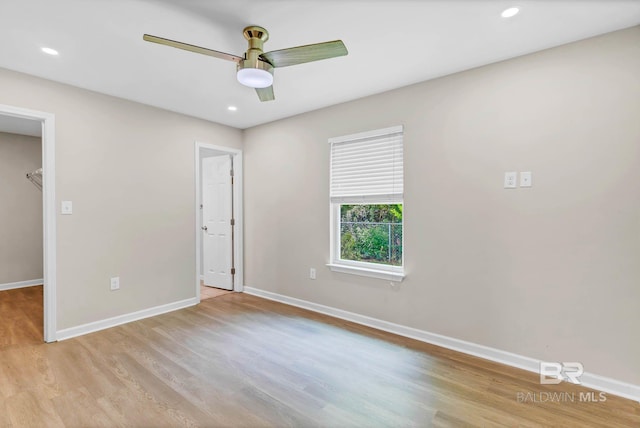 15030 Marem Dr, Foley, AL 36535 - unfurnished bedroom featuring light wood-type flooring, a walk in closet, recessed lighting, and ceiling fan