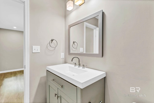 15030 Marem Dr, Foley, AL 36535 - bathroom featuring vanity and wood finished floors