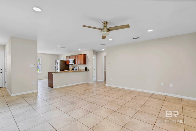 15030 Marem Dr, Foley, AL 36535 - unfurnished living room with recessed lighting, a ceiling fan, and light tile patterned flooring
