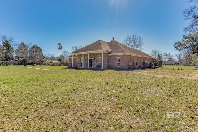 exterior space featuring a front yard