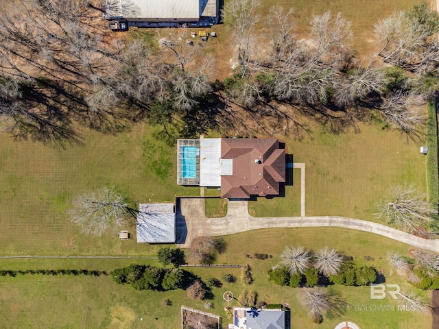 birds eye view of property with a rural view