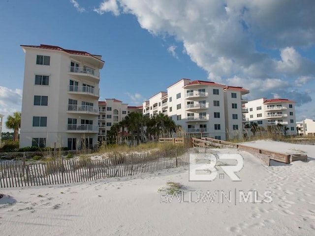 22984 Perdido Beach Blvd Unit A23, Orange Beach, AL 36561 - snow covered property featuring a view of apartment building / complex