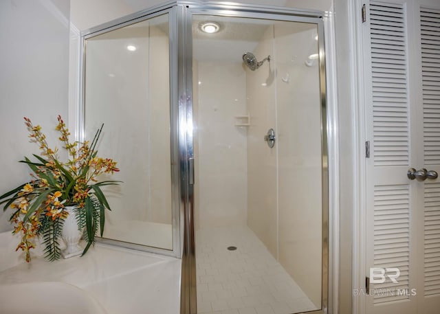 22984 Perdido Beach Blvd Unit A23, Orange Beach, AL 36561 - full bath with a stall shower and a closet