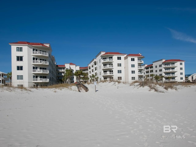 22984 Perdido Beach Blvd Unit A23, Orange Beach, AL 36561 - snow covered property featuring a view of apartment building / complex