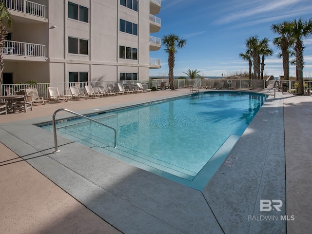 22984 Perdido Beach Blvd Unit A23, Orange Beach, AL 36561 - community pool featuring a patio