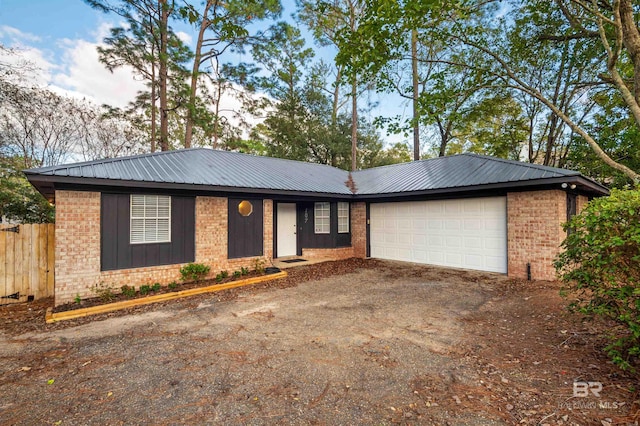 single story home with a garage