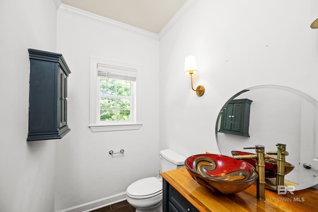 bathroom featuring ornamental molding, tile patterned flooring, vanity, and toilet