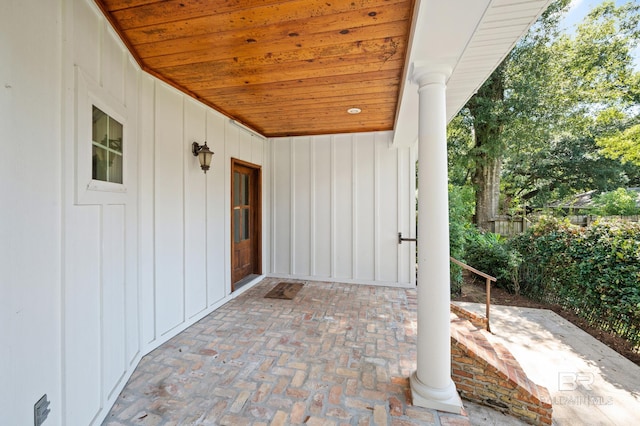 property entrance featuring a patio area