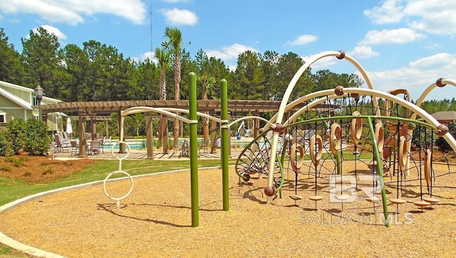 view of playground featuring a pergola