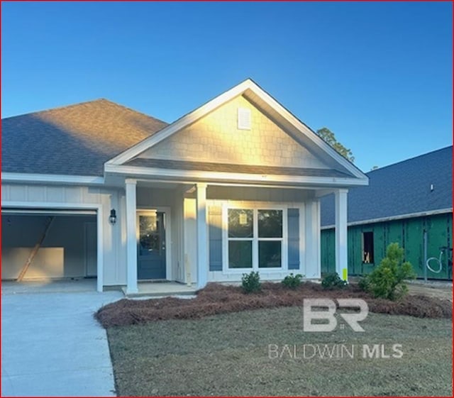 view of front of property with a garage