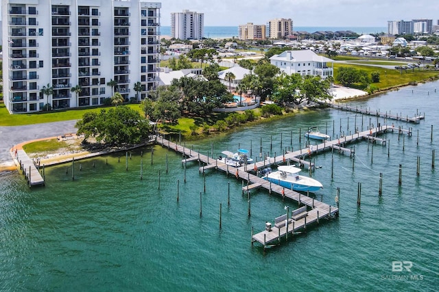 aerial view featuring a water view and a city view