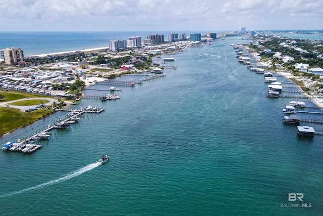 drone / aerial view with a view of city and a water view