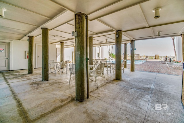 view of patio / terrace featuring a community pool