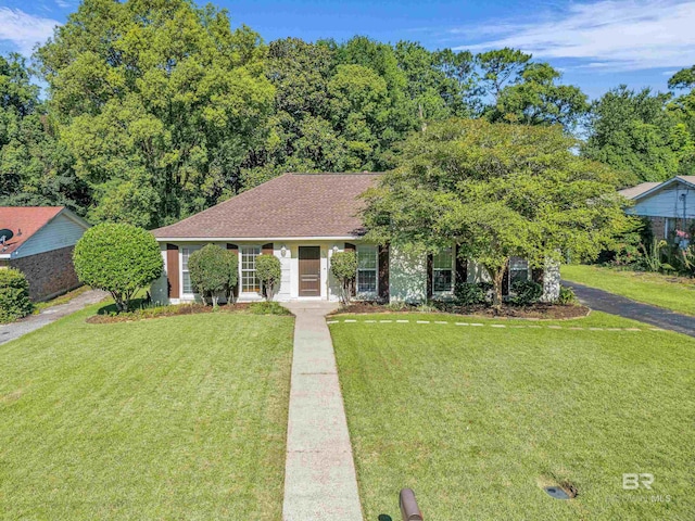 566 Stuart St, Daphne, AL 36526 - view of front of house with a front lawn and roof with shingles