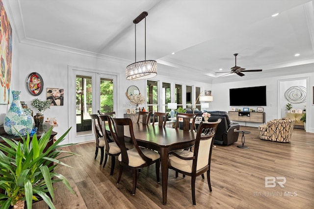 3250 Riviere Du Chien Rd, Mobile, AL 36693 - dining room featuring a tray ceiling, wood finished floors, a ceiling fan, recessed lighting, and french doors