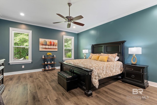 3250 Riviere Du Chien Rd, Mobile, AL 36693 - bedroom with crown molding, multiple windows, dark wood finished floors, baseboards, and recessed lighting