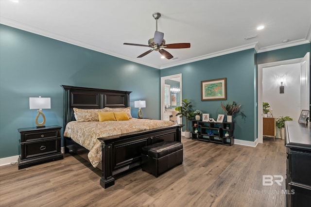 3250 Riviere Du Chien Rd, Mobile, AL 36693 - bedroom with wood finished floors, baseboards, crown molding, recessed lighting, and a ceiling fan