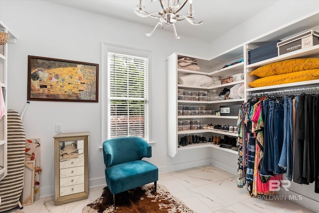 3250 Riviere Du Chien Rd, Mobile, AL 36693 - spacious closet with a chandelier and marble finish flooring